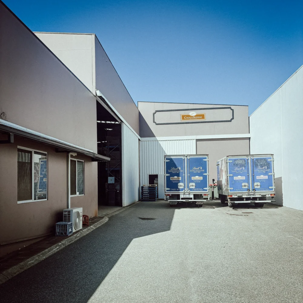 Welshpool warehouse and Lindt delivery trucks at the Welshpool facility
